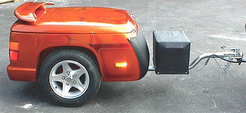 Side profile of FreeRider Sport Trailer highlighting aerodynamic styling